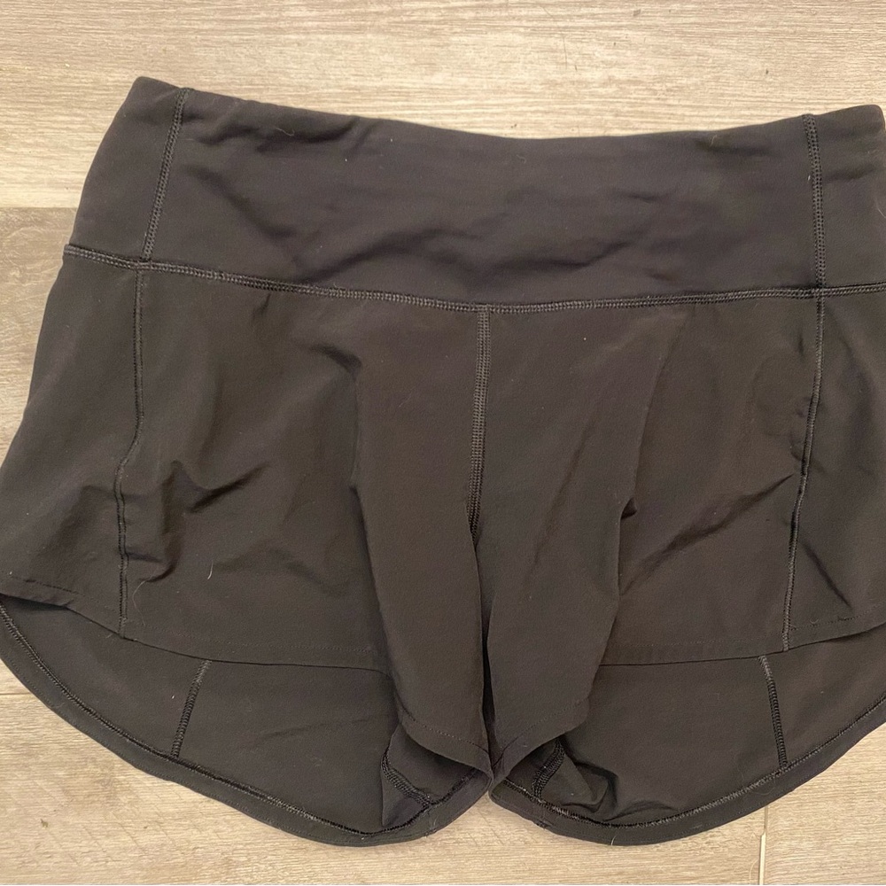 Women's Black Lululemon shorts.